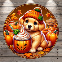 A cute golden retriever puppy wearing a pumpkin-themed hat and sitting next to a carved pumpkin, surrounded by pumpkins and autumn leaves.