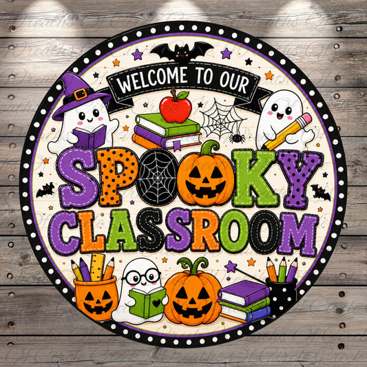 The image is a circular sign with a Halloween theme, featuring a witch, ghost, pumpkin, apples, books, pencils, and a spider web. The sign says "Welcome to our Spooky Classroom" and includes various Halloween-themed elements such as bats, stars, and a spider web.