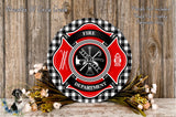 a decorative fire department emblem with a red and black checkered background, surrounded by a floral arrangement and a wooden wall.