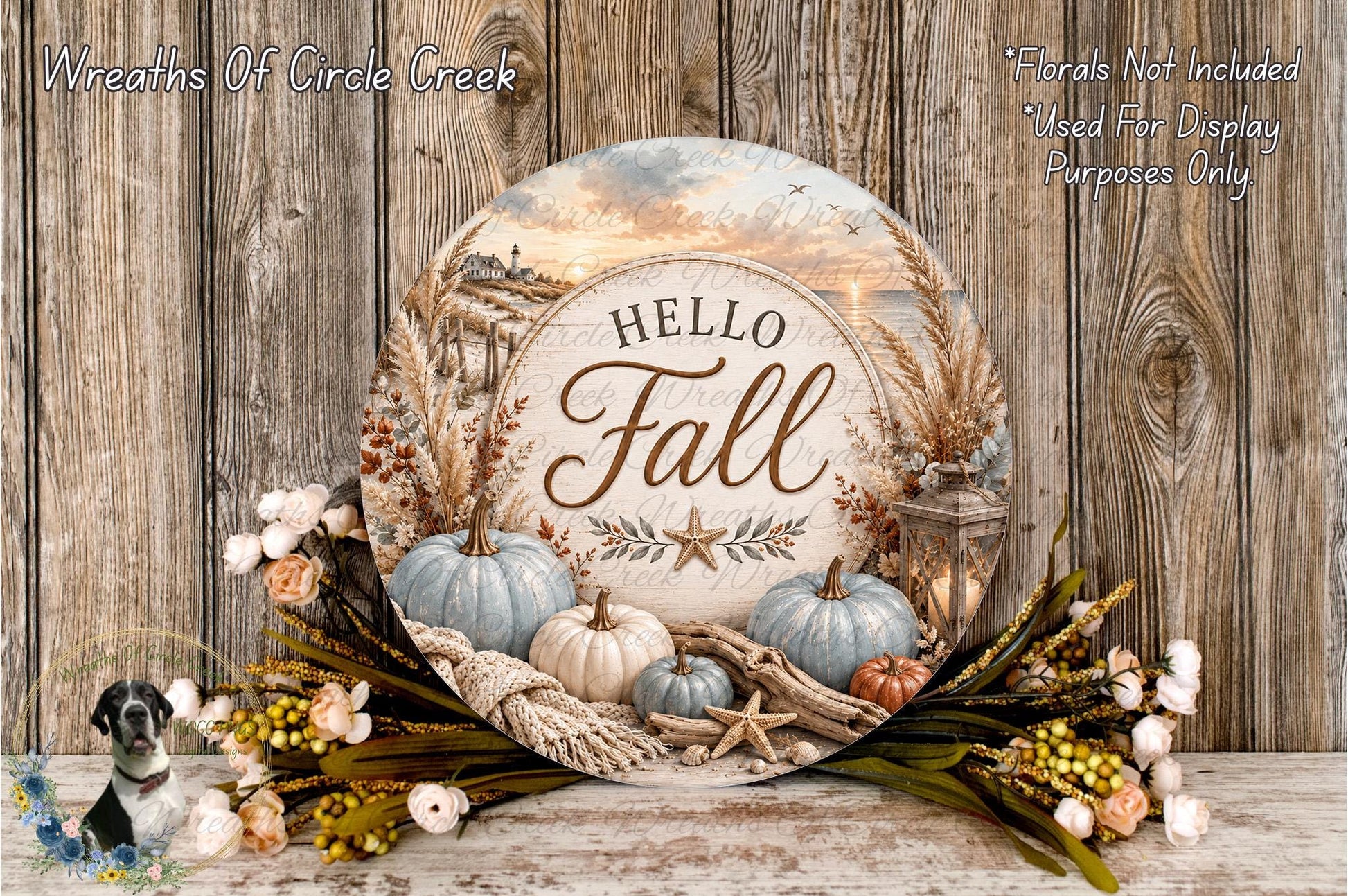 a decorative wreath with the text "Hello Fall" displayed on it, surrounded by autumn-themed elements such as pumpkins, leaves, and flowers. The wreath is set against a rustic wooden background, creating a warm and seasonal atmosphere.