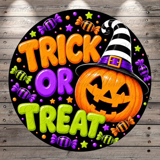 a Halloween-themed design with a jack-o-lantern wearing a witch's hat, surrounded by candy, stars, and the text "TRICK OR TREAT".