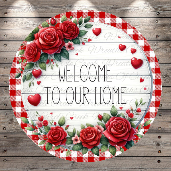 a round sign with a floral border and the text "Welcome to our home" written on it. The sign is surrounded by red roses and hearts, creating a warm and welcoming atmosphere.