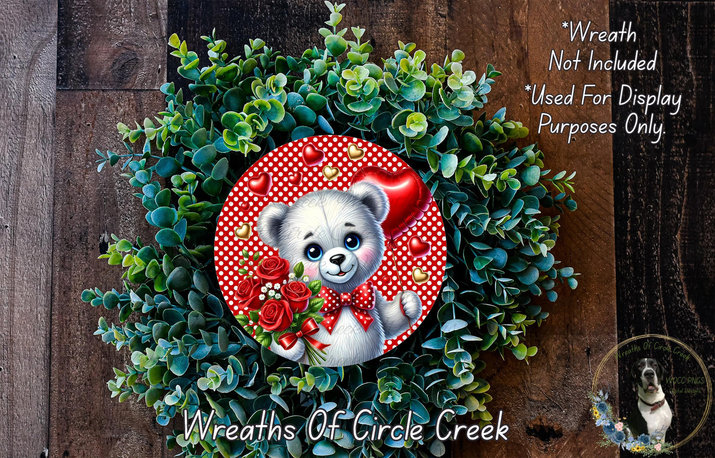 A wreath made of green leaves and red flowers, with a cute white teddy bear wearing a red bow tie and holding a bouquet of red roses.