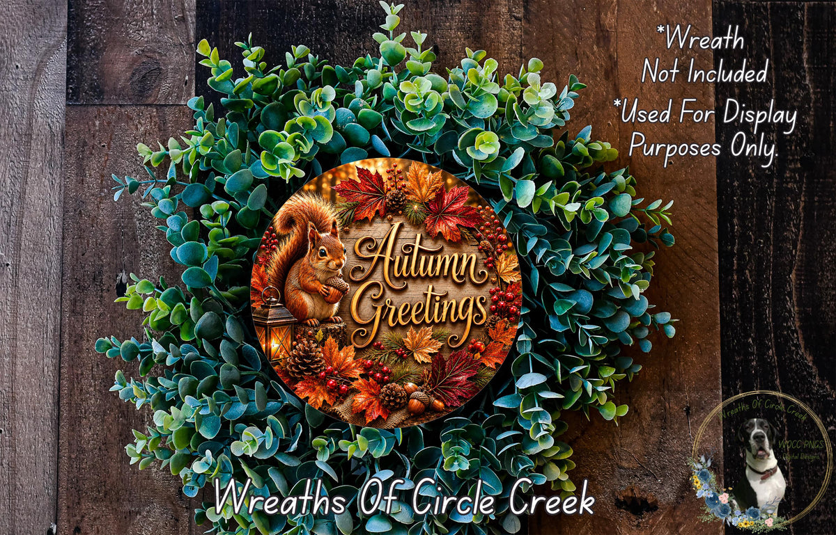 a wreath made of various autumn-themed elements, including a squirrel, leaves, pine cones, and berries, with the text "Autumn Greetings" displayed on it.
