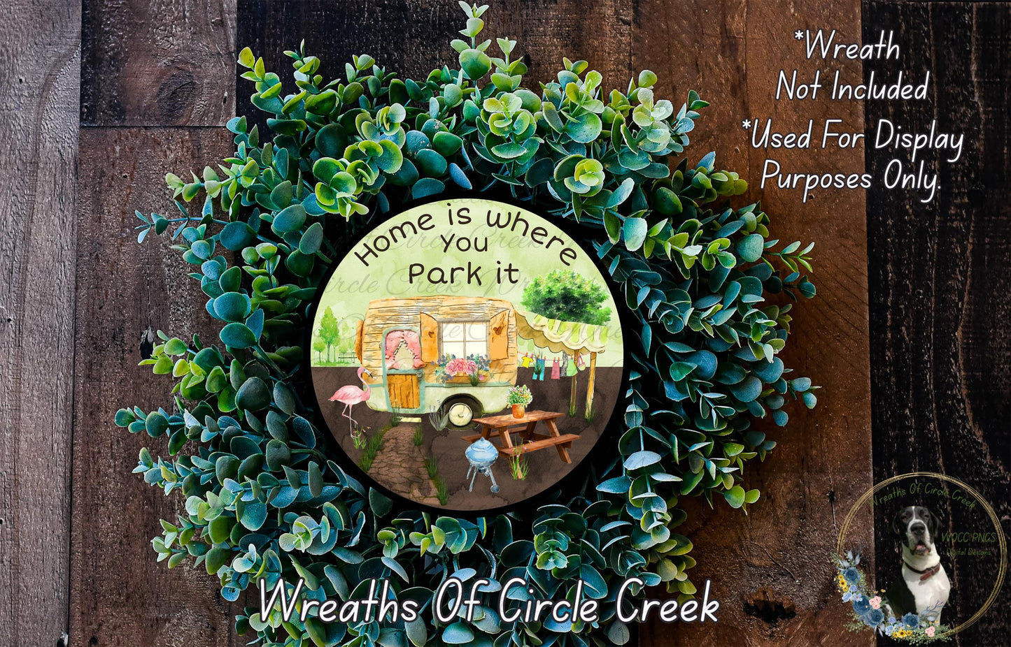 a wreath with a picture of a camper on it