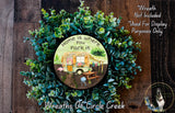 a wreath with a picture of a camper on it