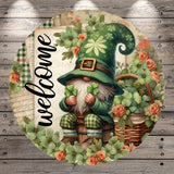 A gnome holding a four-leaf clover is surrounded by flowers and a basket, with the word "welcome" written on a piece of paper in the background.