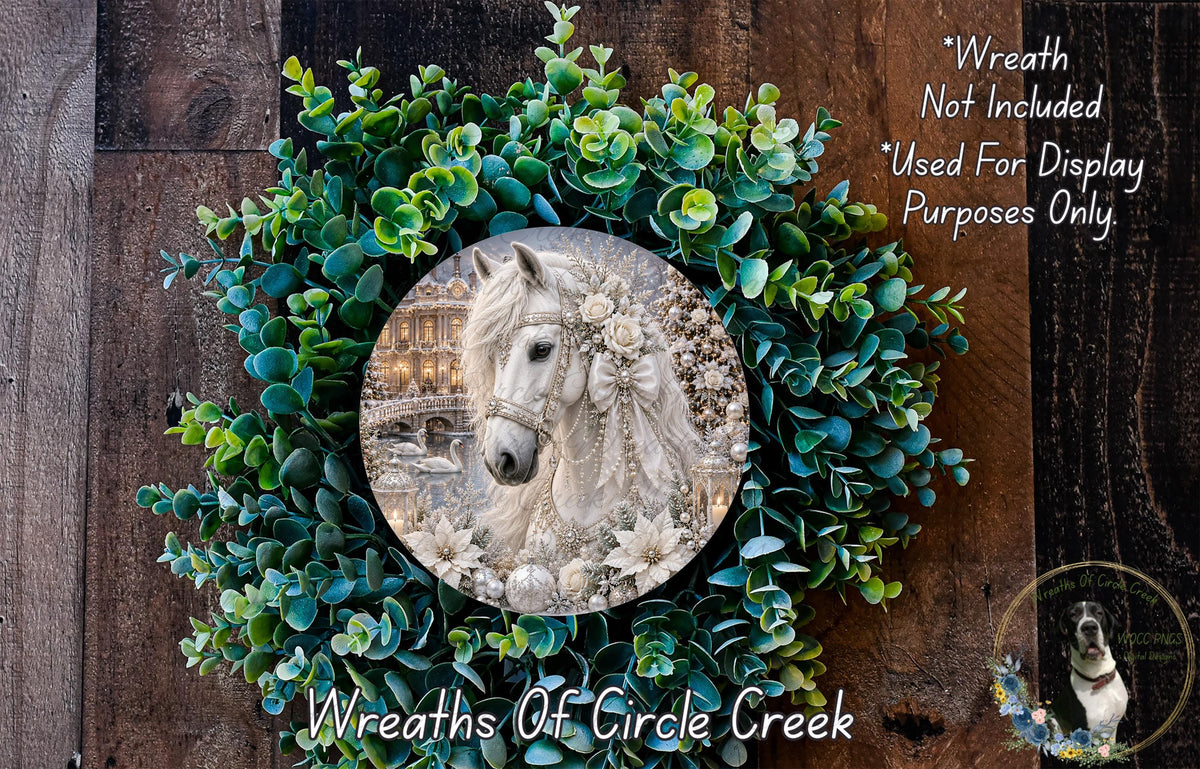 A wreath made of green leaves and flowers, with a white horse image inside the wreath.