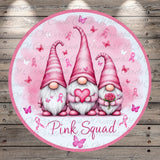 three pink gnomes holding pink roses and butterflies, with the text "Pink Squad" written below them.