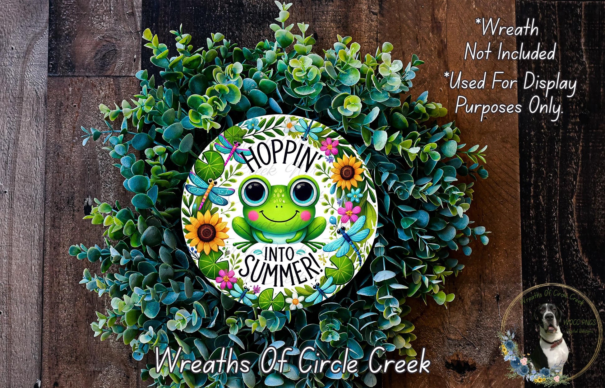 a wreath with a green frog painted on it