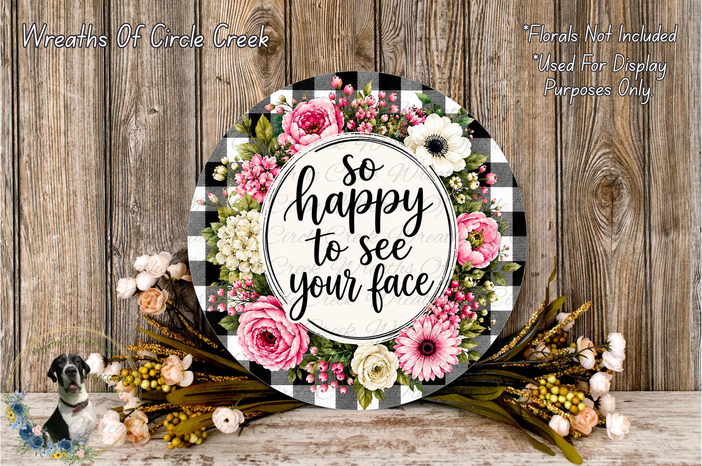 A decorative wreath with a floral design and the text "So happy to see your face" is displayed on a wooden surface.
