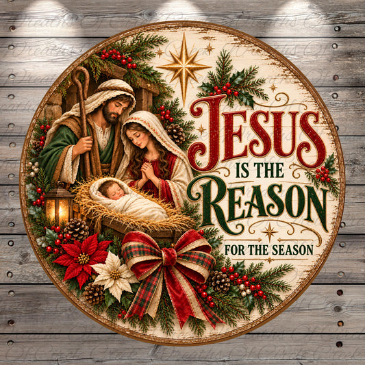 A circular Christmas-themed sign with a nativity scene, featuring the three figures of the Virgin Mary, Joseph, and baby Jesus. The sign is surrounded by holiday decorations such as pine cones, berries, and a bow. The text "Jesus is the Reason for the Season" is displayed prominently in the center of the sign.