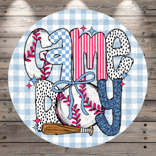 A circular graphic design featuring the word "CameDy" in a stylized font, surrounded by various sports-related elements such as a baseball, a baseball bat, and a baseball glove.