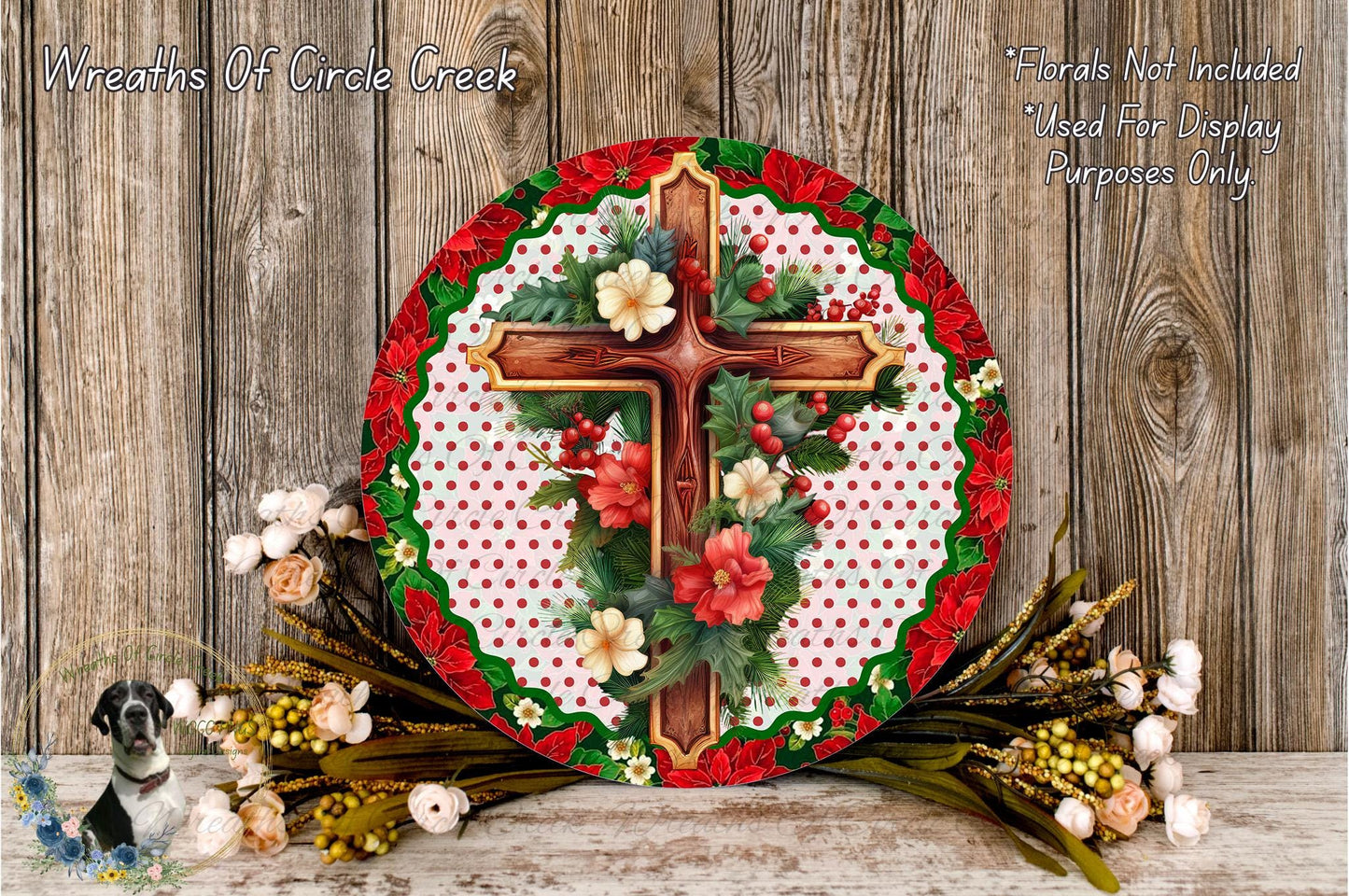 a decorative wreath with a cross and floral elements, placed on a wooden surface.