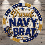 a circular graphic with the text "Proud Navy Brat" in a decorative font, surrounded by stars and an anchor symbol.