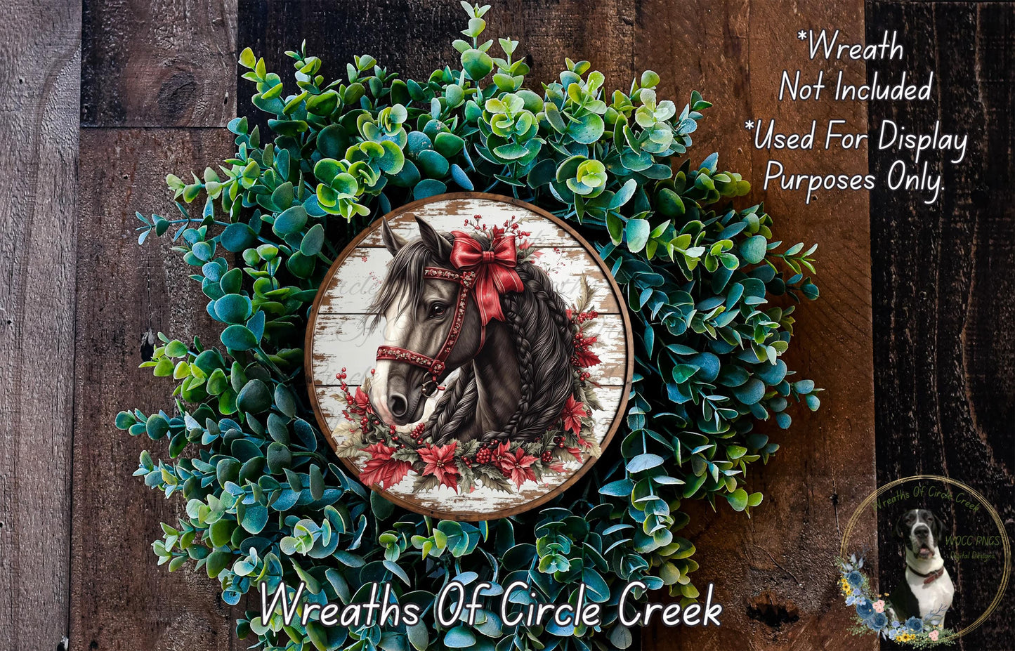 A wreath made of green leaves and flowers, with a horse's head and bow as the central decorative element.