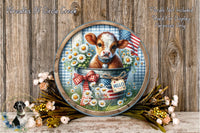 A decorative plate featuring a cow surrounded by flowers and an American flag, with the word "Hello" written on it. The plate is placed on a wooden surface, and there are flowers and a bird in the background.