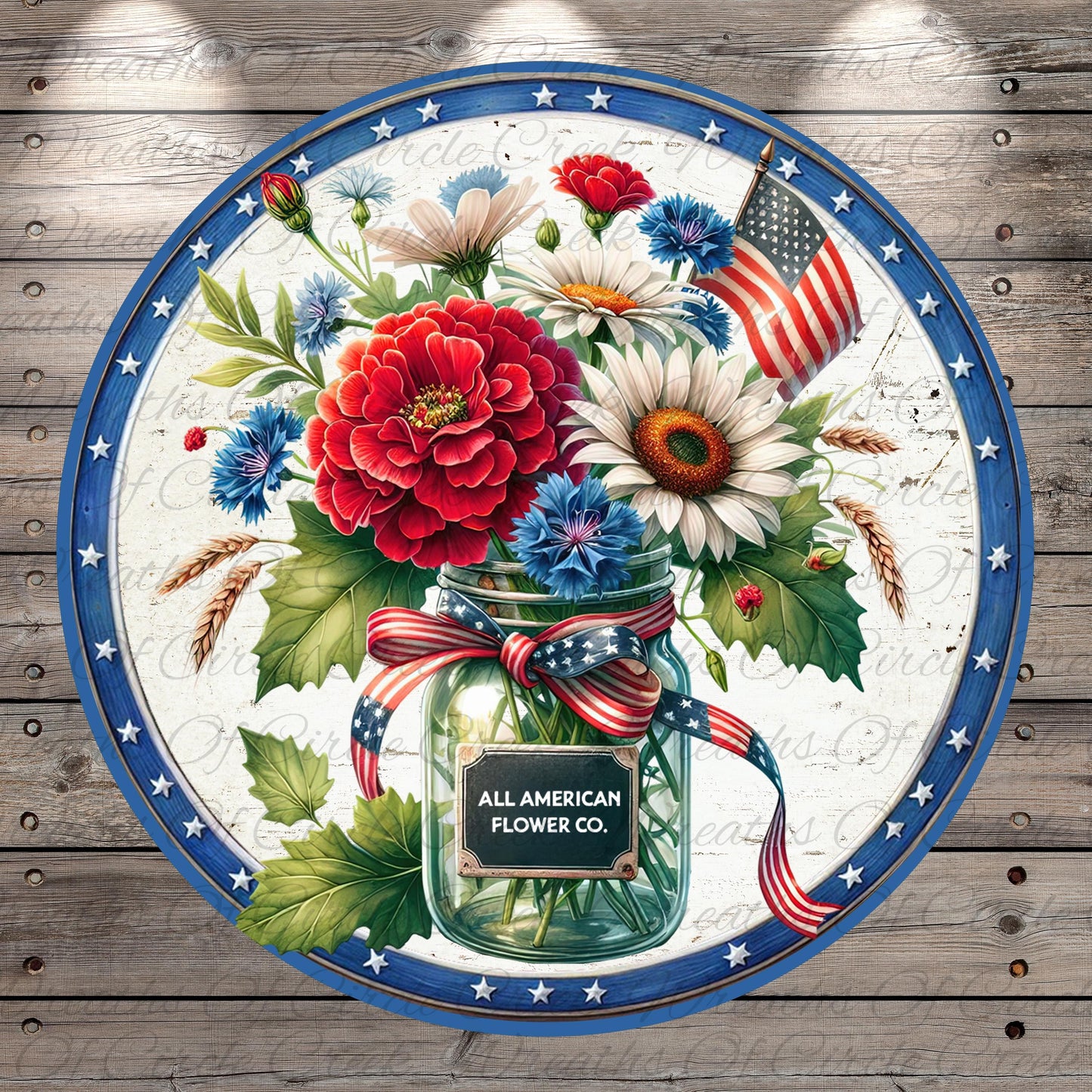 A round floral arrangement in a mason jar, surrounded by an American flag and a blue border with stars, set against a wooden background.