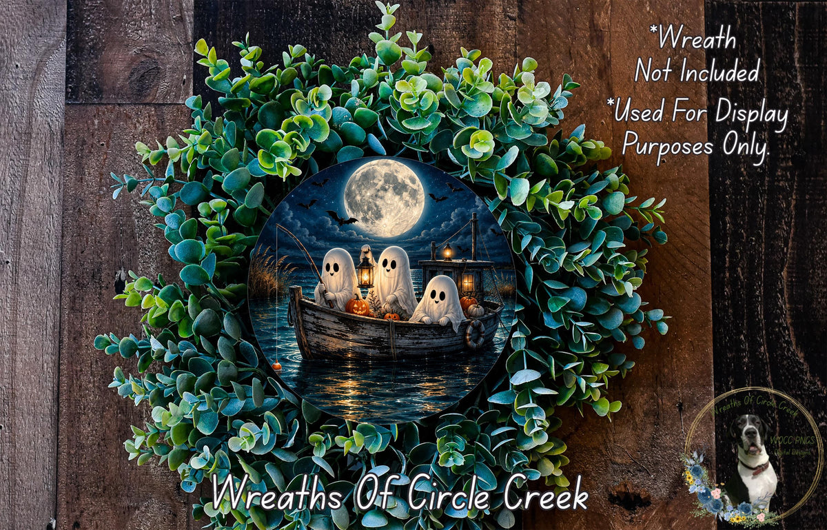 A Halloween-themed wreath with a full moon, ghostly figures, and a boat on the water. The wreath is surrounded by greenery and has a text overlay that reads "Wreath Not Included * Used For Display Purposes Only".