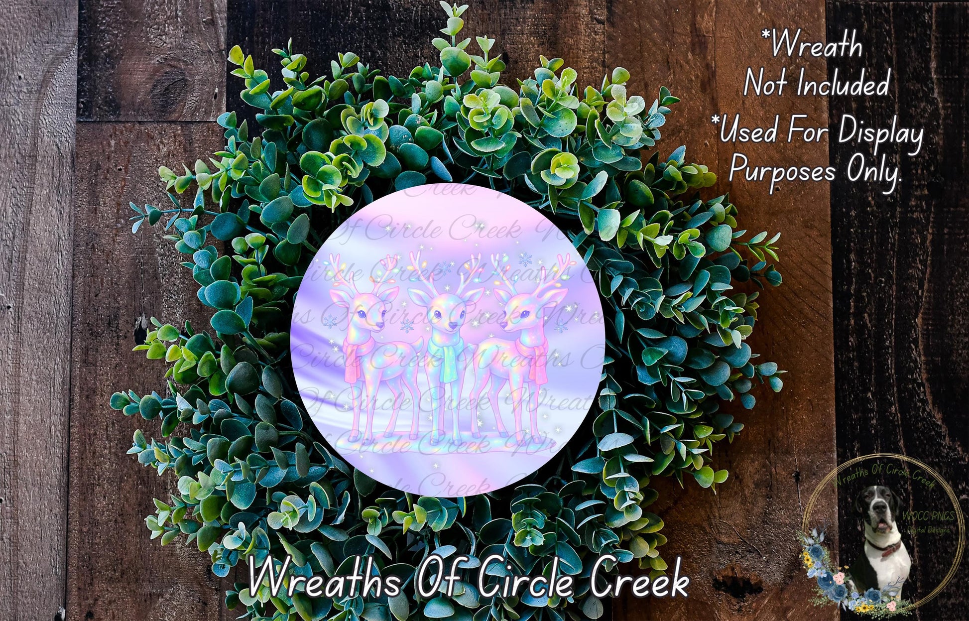 a wreath made of green leaves and a circular design with a purple and pink background, possibly featuring a group of deer or other animals.