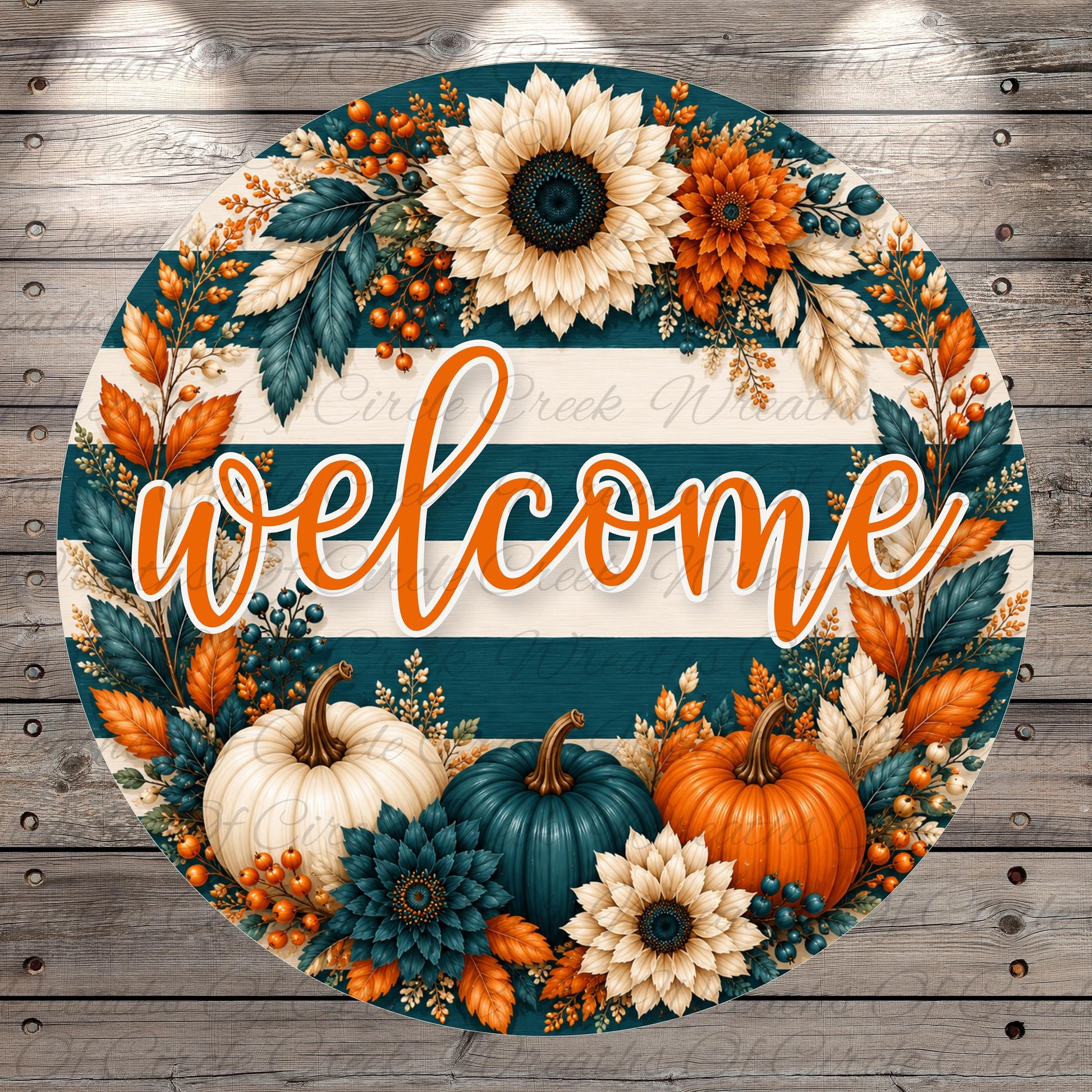 A colorful welcome sign featuring a floral wreath with sunflowers, pumpkins, and autumn leaves, along with the word "welcome" written in orange cursive text.