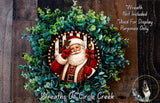 A wreath featuring a Santa Claus figure surrounded by greenery, with a caption stating that the wreath is not included in a display and is used for purposes only.