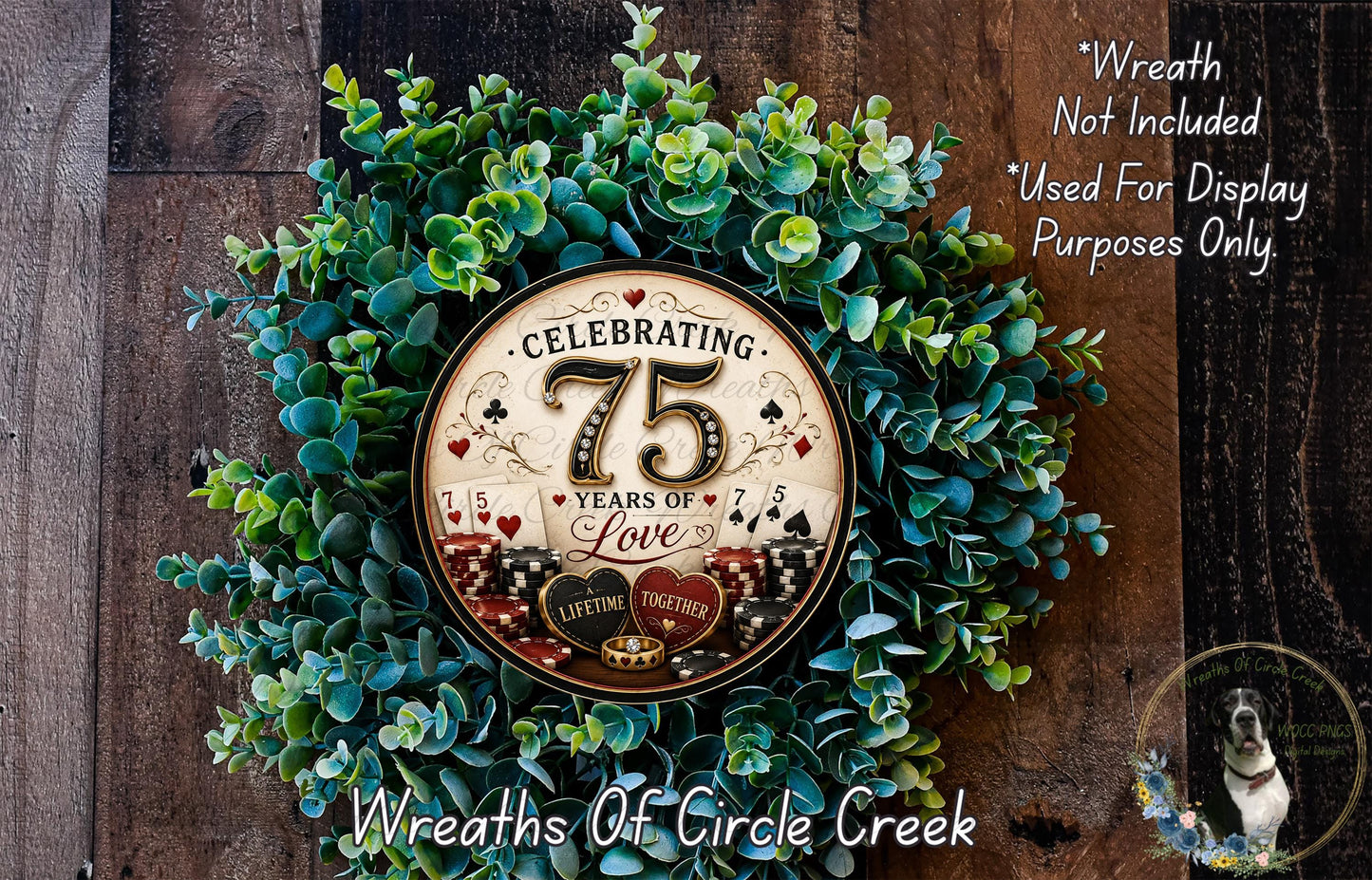 A wreath made of green leaves and a circular plaque with the text "Celebrating 75 Years of Love" is displayed on a wooden surface.