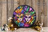 a vibrant and colorful painting of two faces, each adorned with elaborate masks and feathers, set against a rustic wooden background. The painting is surrounded by an array of flowers and foliage, creating a festive and decorative atmosphere.