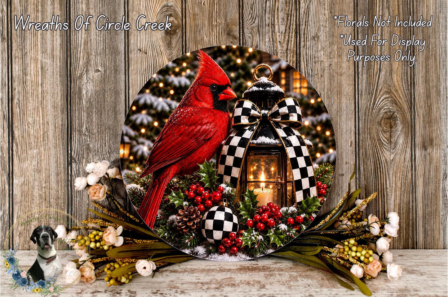 A red cardinal perched on a wreath with a lantern, surrounded by berries, pine cones, and other holiday decorations, set against a backdrop of twinkling lights.