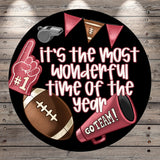 a football-themed design with various football-related items, including a football, a football helmet, a football, and a football-related object. The text on the image reads "It's the most wonderful time of the year" and "GO TEAM!"