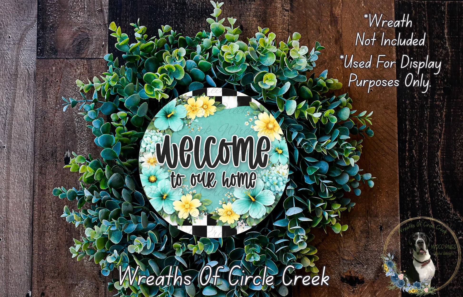a wreath with a sign that says "Welcome to our home" surrounded by various green and yellow flowers. The wreath is placed on a wooden surface, and there is a small dog in the bottom right corner of the image.