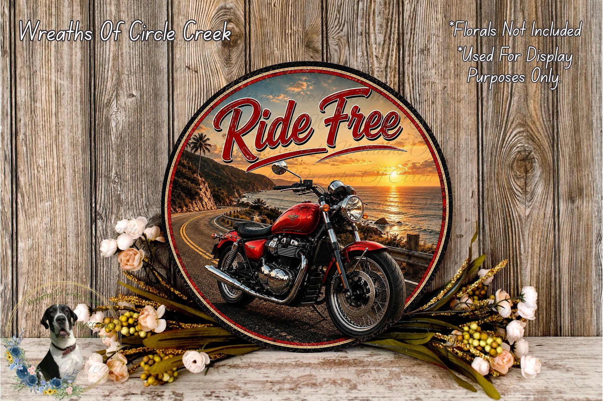 a red motorcycle parked on a road with a scenic background, surrounded by flowers and a wooden wall.