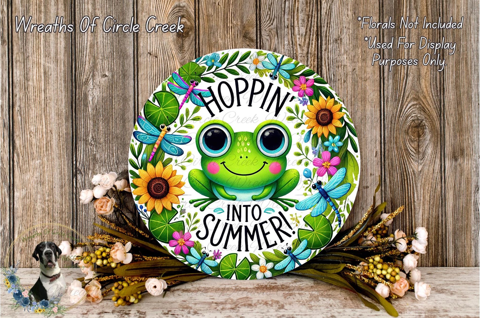 a picture of a frog with flowers on it