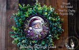A wreath featuring a Santa Claus figure surrounded by greenery and flowers, with a full moon visible in the background.
