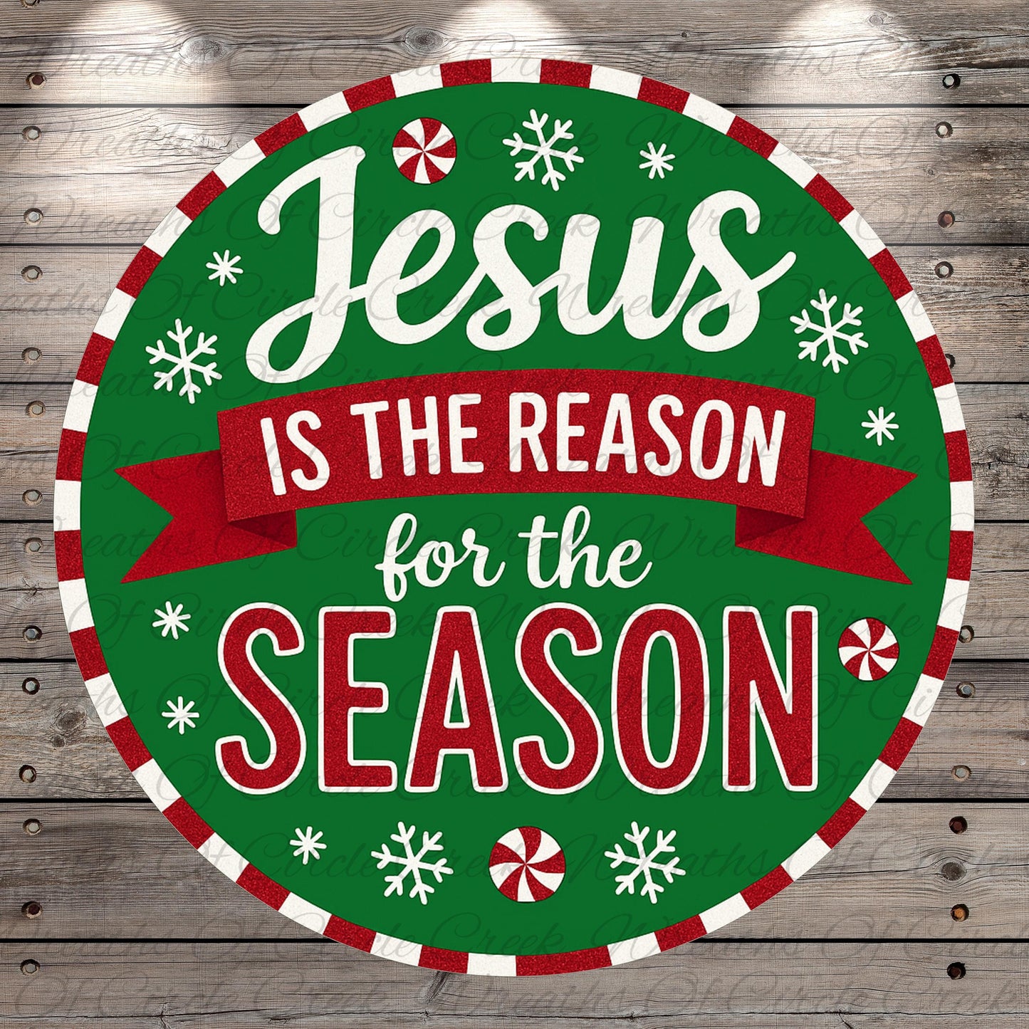 A circular Christmas-themed sign with the text "Jesus is the reason for the season" in a festive style, surrounded by snowflakes and red and white stripes.