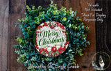 A wreath made of various green and red foliage, with a circular sign in the center that reads &quot;Merry Christmas&quot;. The wreath is displayed on a wooden surface, and there is a text overlay that says &quot;Wreath Not Included * Used For Display Purposes Only&quot;.