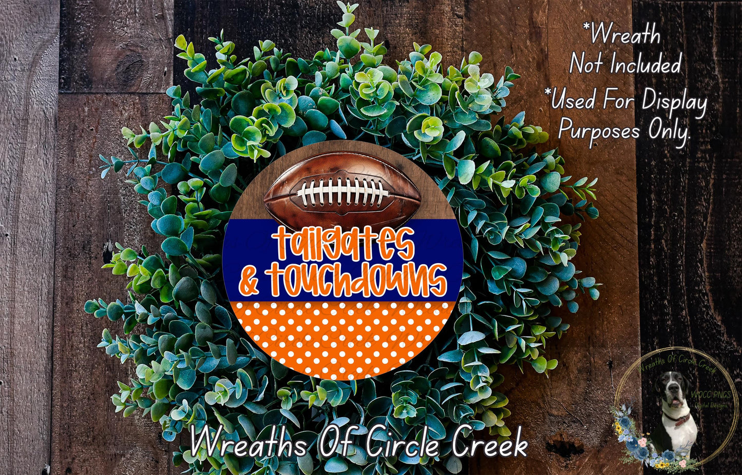 a wreath made of green foliage and a football, with the text "Toiletries & Touchdowns" written on it. The wreath is displayed on a wooden surface, and there is a small dog in the bottom right corner of the image.