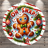 A festive Christmas-themed illustration featuring a gingerbread man surrounded by holiday decorations such as ornaments, pine branches, and berries. The text "OH.SNAP!" is prominently displayed, adding a playful and whimsical touch to the overall design.
