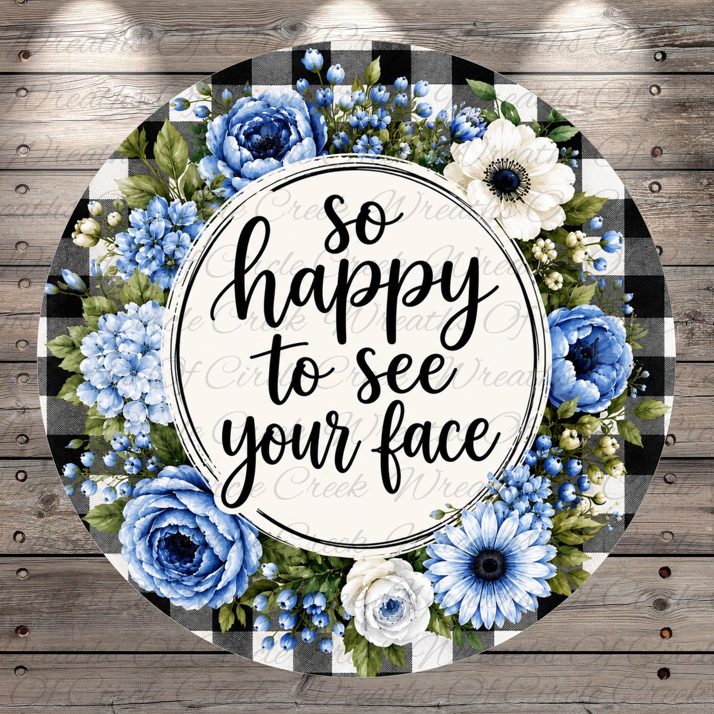 A circular floral wreath with a white border and black text that reads "So happy to see your face".