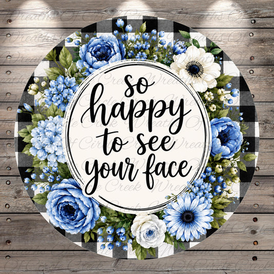 A circular floral wreath with a white border and black text that reads "So happy to see your face".
