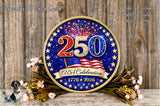 a circular plaque with the number "250" and the text "USA Celebration 1776 2016" on it, surrounded by a wreath of flowers and a wooden background.