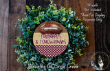 a wreath made of green foliage and a football, with the text "Tailgates & Touchdowns" displayed on it.