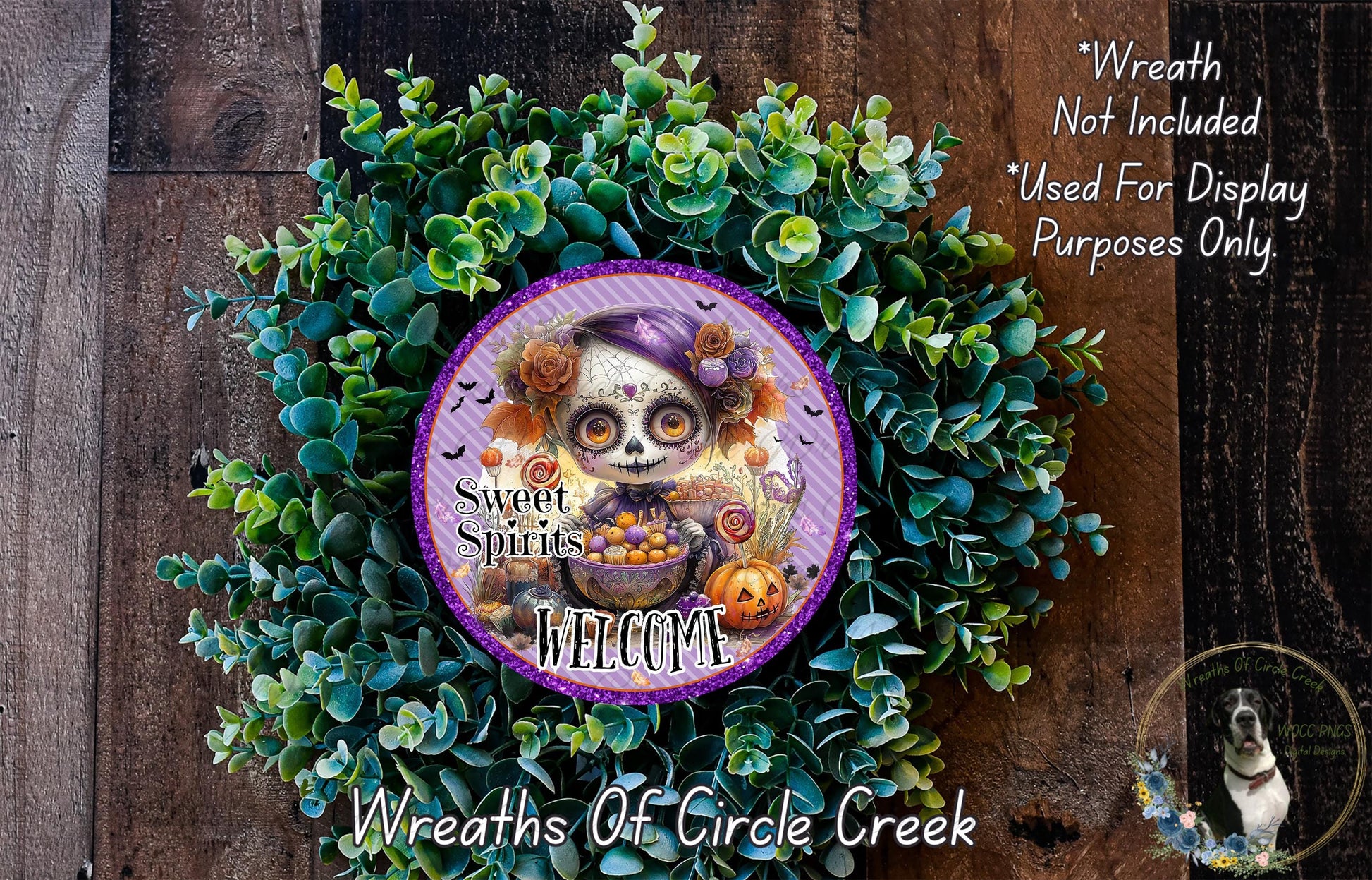 a wreath with a skull and floral design, surrounded by greenery, and a purple sign with the text "Sweet Spirits Welcome".