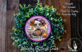 a wreath with a skull and floral design, surrounded by greenery, and a purple sign with the text "Sweet Spirits Welcome".