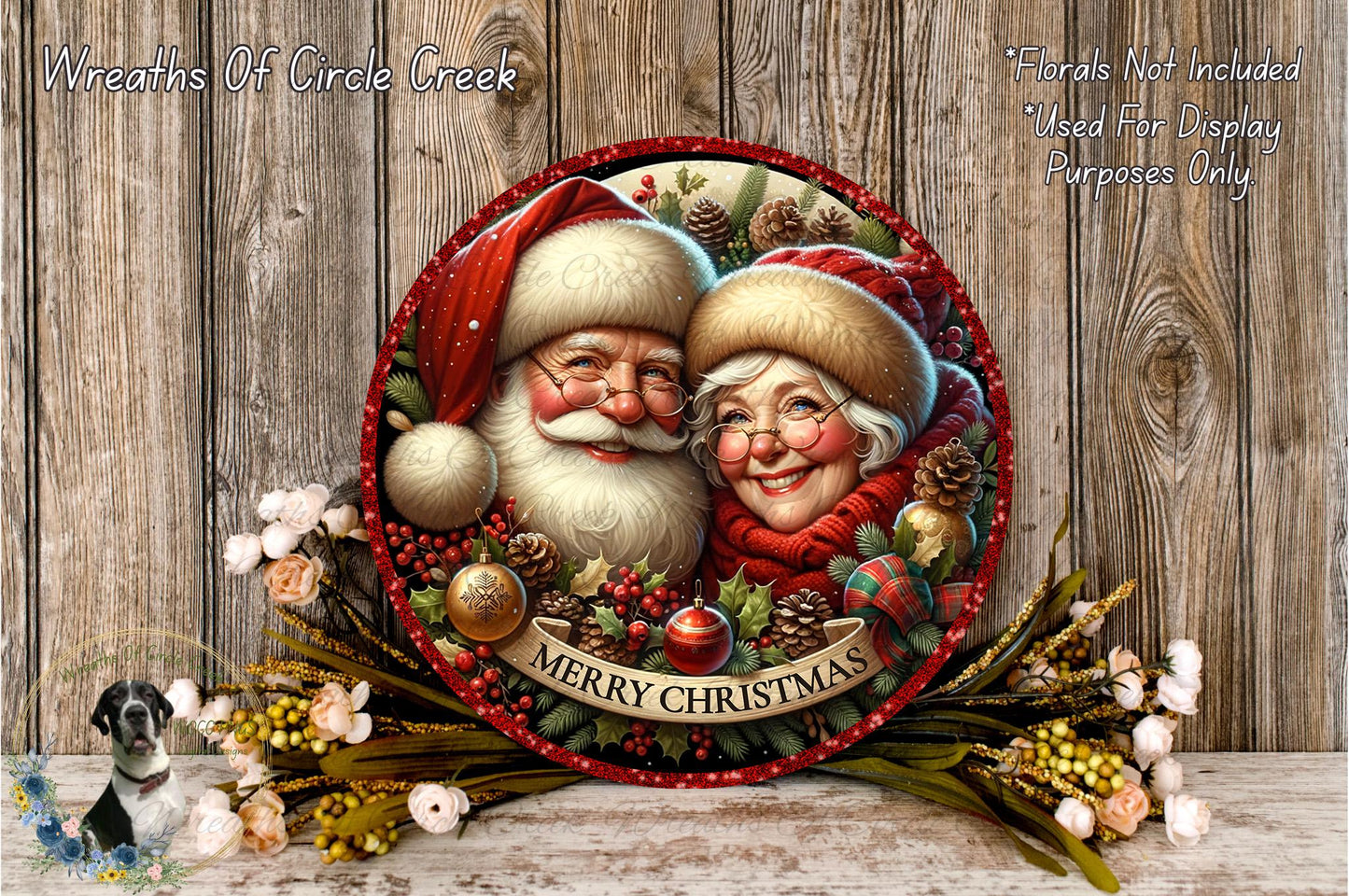 A festive Christmas wreath featuring Santa Claus and his reindeer, surrounded by holiday decorations such as pine cones, berries, and flowers. The wreath is displayed on a wooden surface, and the text "Merry Christmas" is visible.