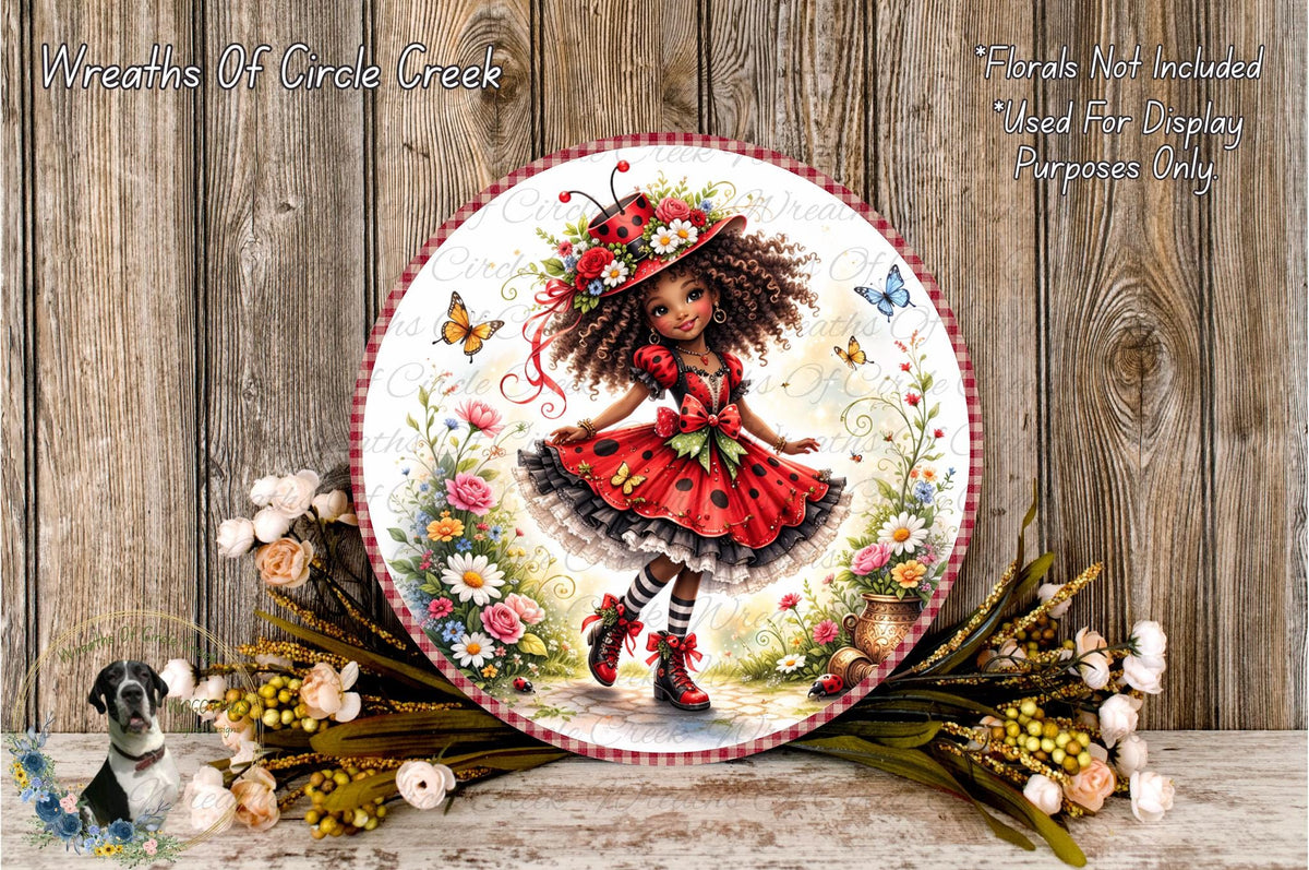 A decorative plate featuring a whimsical illustration of a young girl with curly hair, wearing a red dress and a red hat, surrounded by flowers and butterflies.