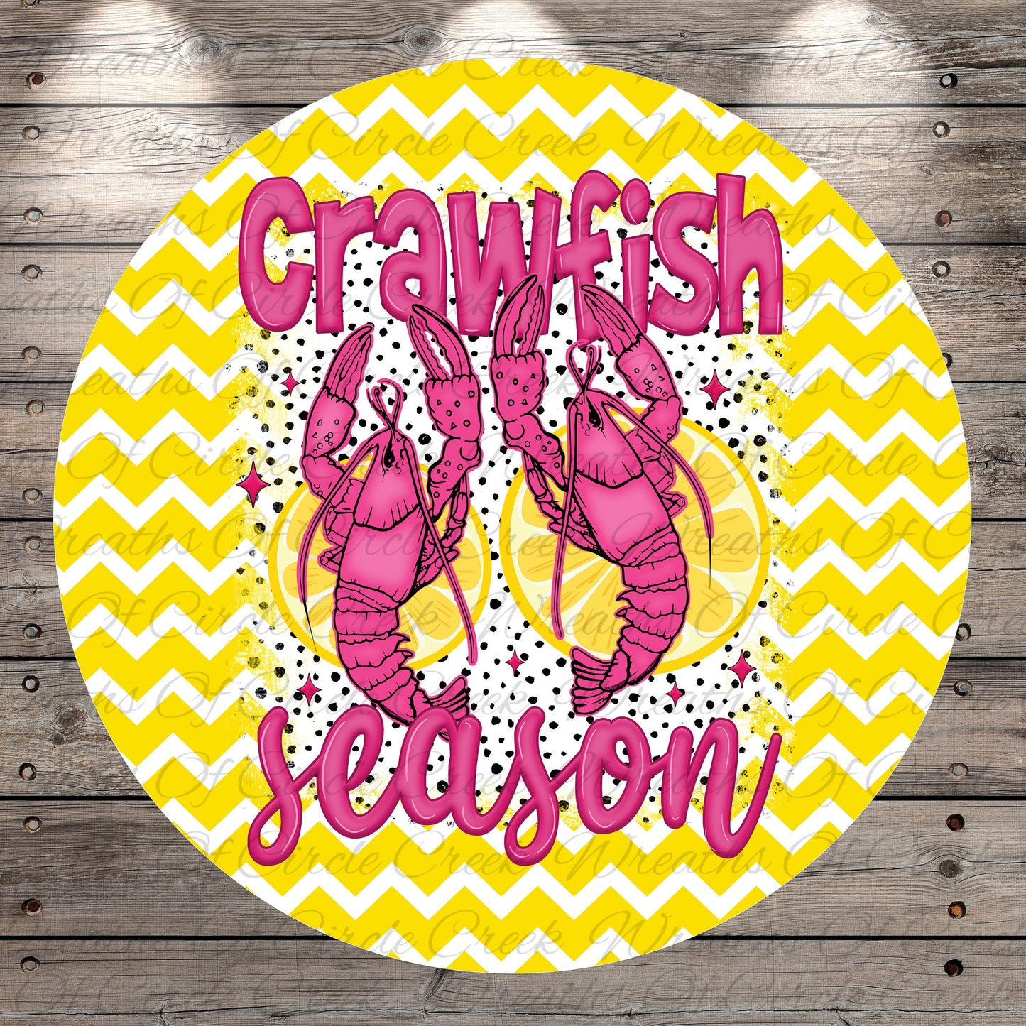a circular design with a yellow and white chevron pattern, and two pink lobsters holding lemons. The text "Crawfish season" is written in pink letters above the lobsters.