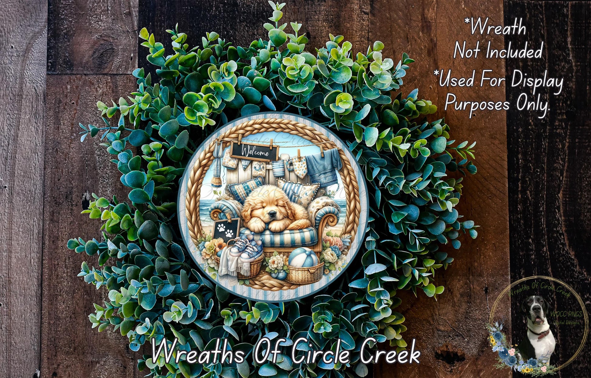 a wreath with a dog and various objects, including a sign that says "Welcome". The wreath is surrounded by a lush green plant, and there is a small dog in the bottom right corner of the image.