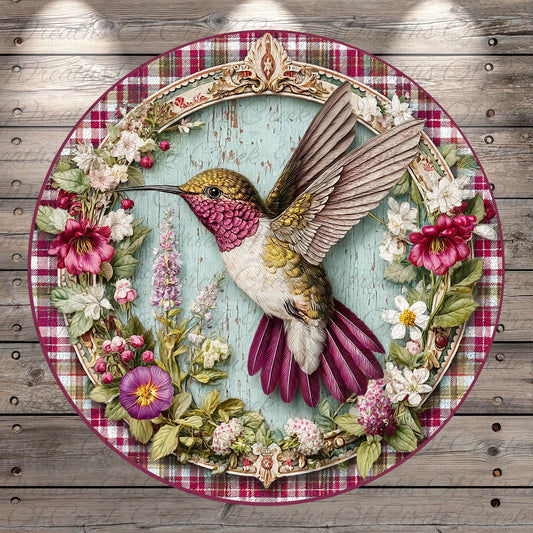 A decorative plate featuring a detailed illustration of a hummingbird surrounded by a floral wreath.