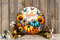 A decorative wreath with a floral design, featuring pumpkins, sunflowers, and butterflies. The word "Hello" is written on the wreath. The wreath is placed on a wooden surface, surrounded by flowers.